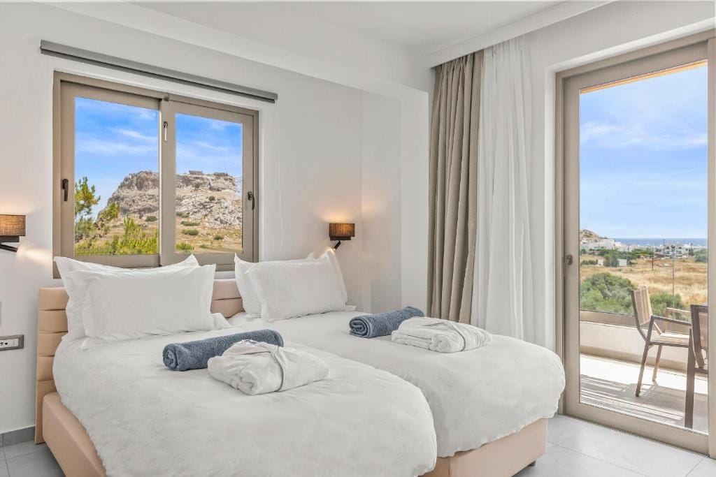 KOUROS STONE SUITES — 2
