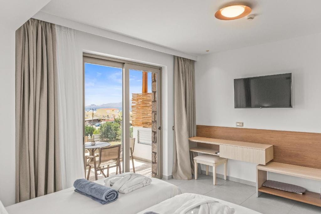 KOUROS STONE SUITES — 5